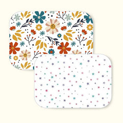 Floral + Star baby dry sheet combo pack, both waterproof mats laid side by side