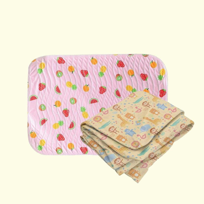 Fruit print baby dry sheet and animal print crib sheet shown together
