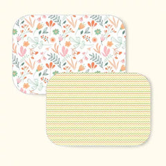 Leaves + Zig-Zag baby dry sheet combo pack, both waterproof mats laid side by side