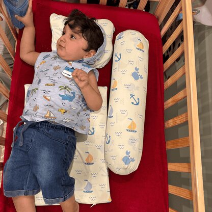 Baby Using Happy Matty Nautical Print Wedge Pillow and Cuddle Bolster for Comfortable Rest